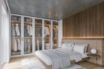 nowoczesna sypialnia szafa z przeszklonymi drzwiami łóżko drewniane